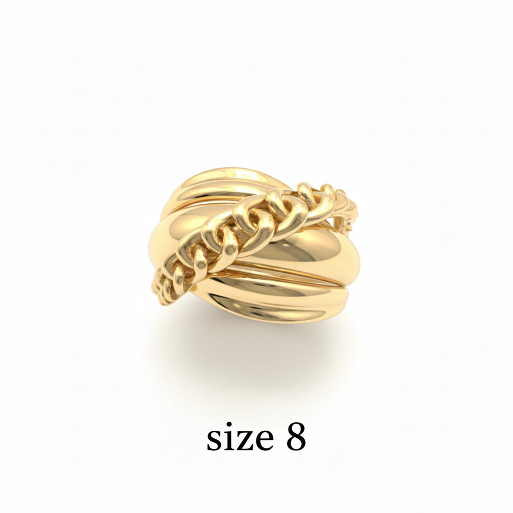 Anillo ancho de Oro 14K con diseño entrelazado de bandas cruzadas sobre fondo blanco de TuOro