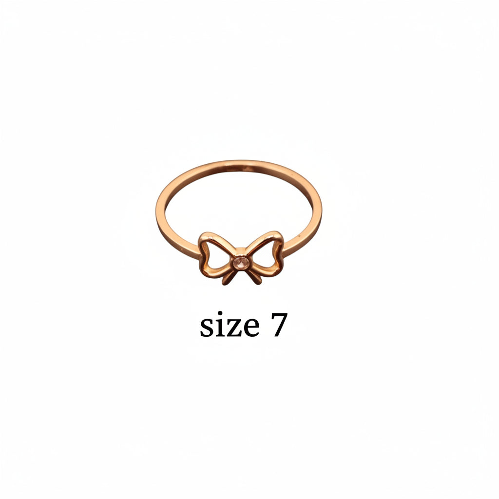 Anillo fino en Oro 14K con diseño de lazo y circonia central, vista frontal minimalista de la colección Anillos Finos en Oro 14K de TuOro.