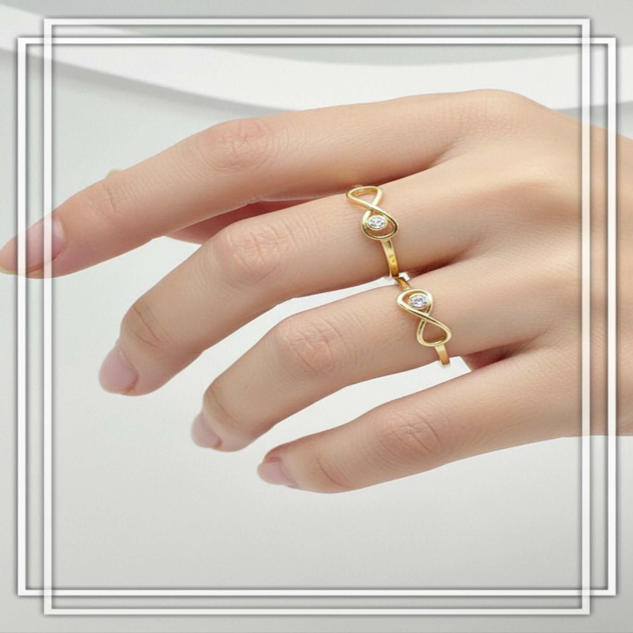 Anillos finos en Oro 14K con diseño infinito y detalle de circonia, estilo moderno y delicado de la colección Anillos Finos en Oro 14K de TuOro.