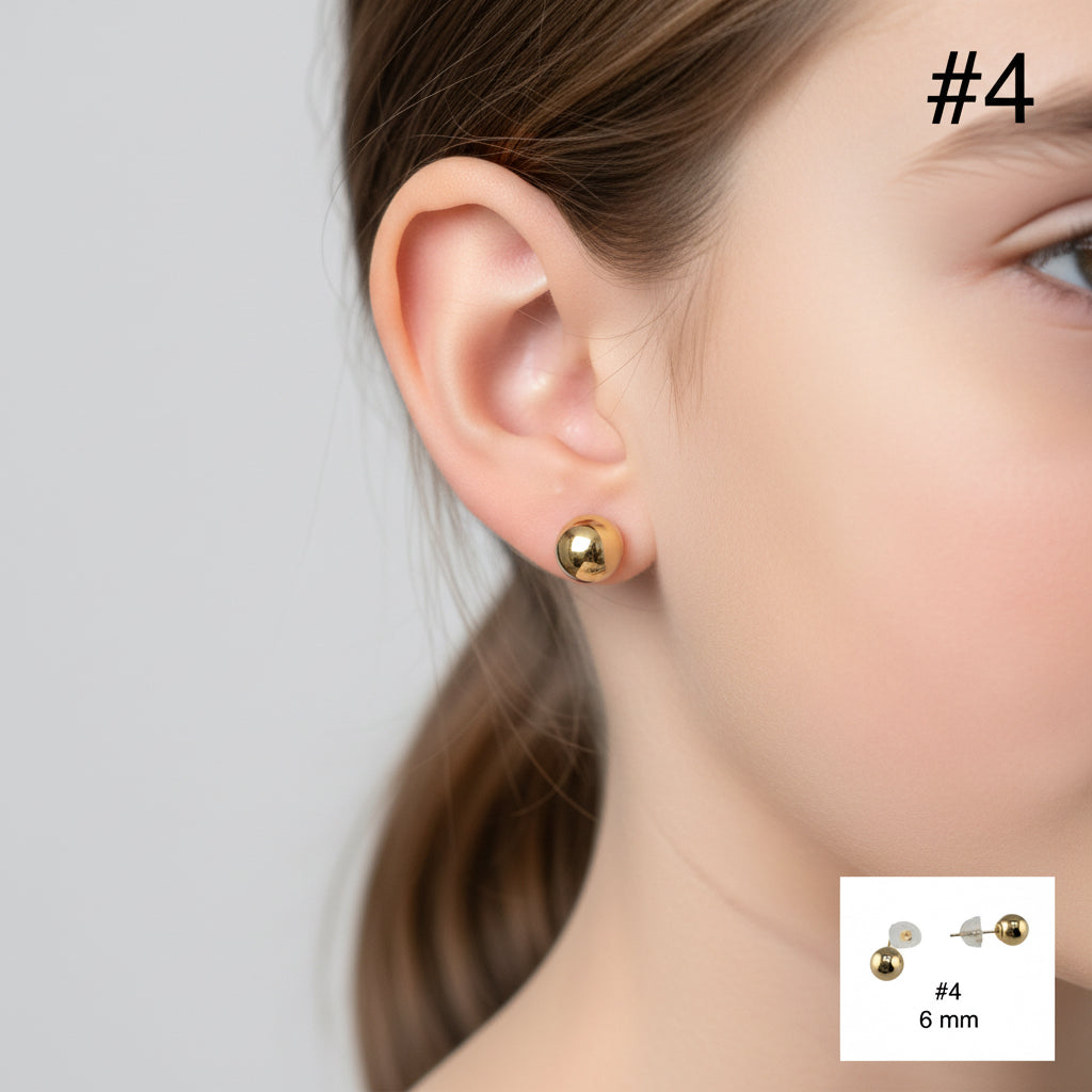 Aretes dormilonas en oro 14k de 6 mm con diseño de bola, cierre de presión y disco de seguridad, ideales para uso diario elegante, TuOro.