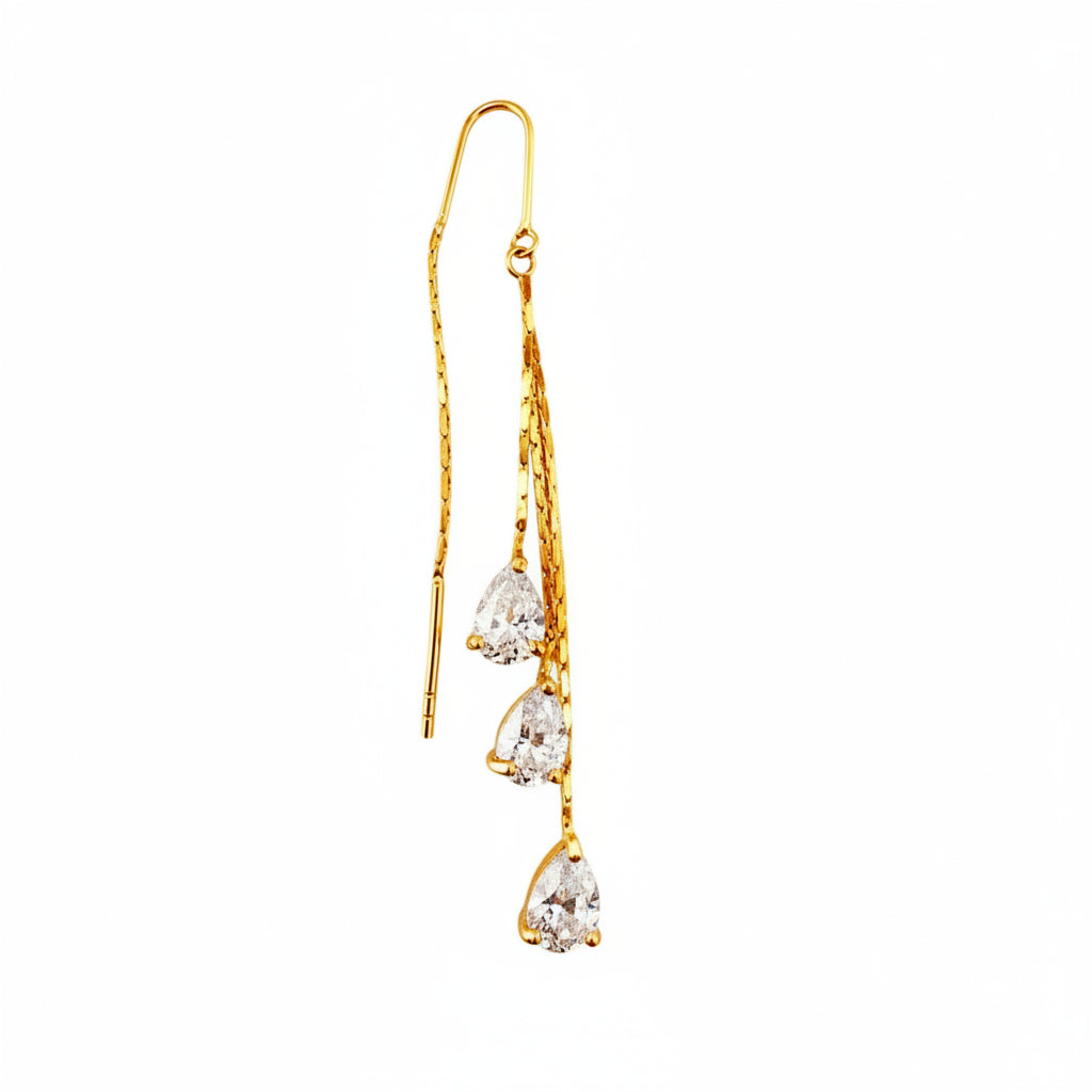 Aretes enhebradores largos en oro 14K con circonias en forma de gota brillantes, diseño elegante y moderno.