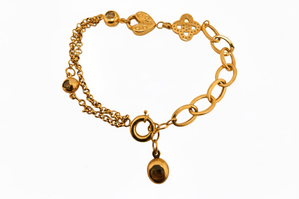 Pulsera Rolo en Oro 14K con trébol y candado