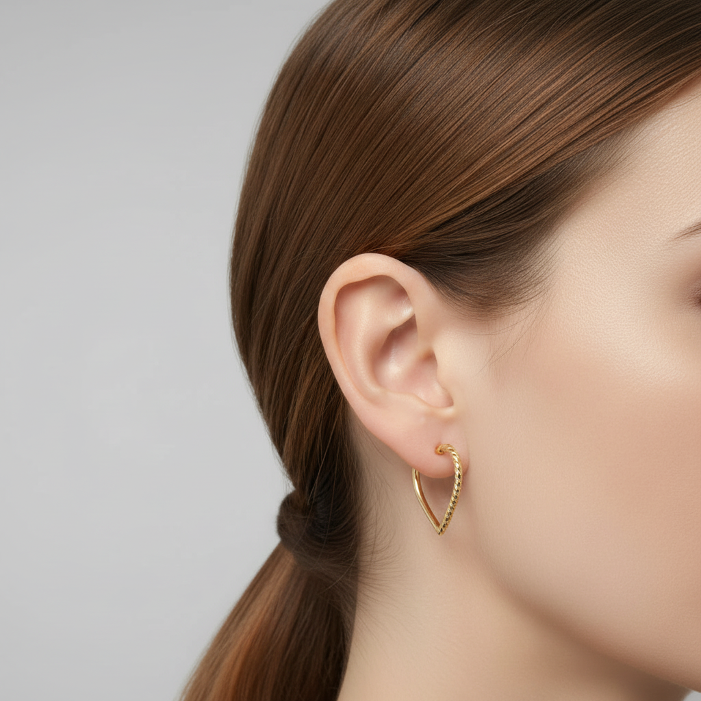 Aretes argollas de corazón en Oro 14K