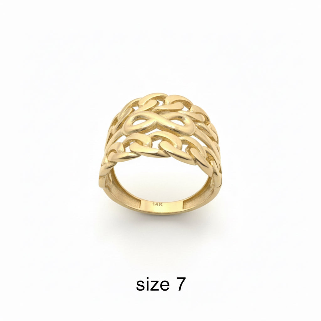 Anillo ancho de Oro 14K con diseño infinito calado y estructura abierta sobre fondo blanco de TuOro