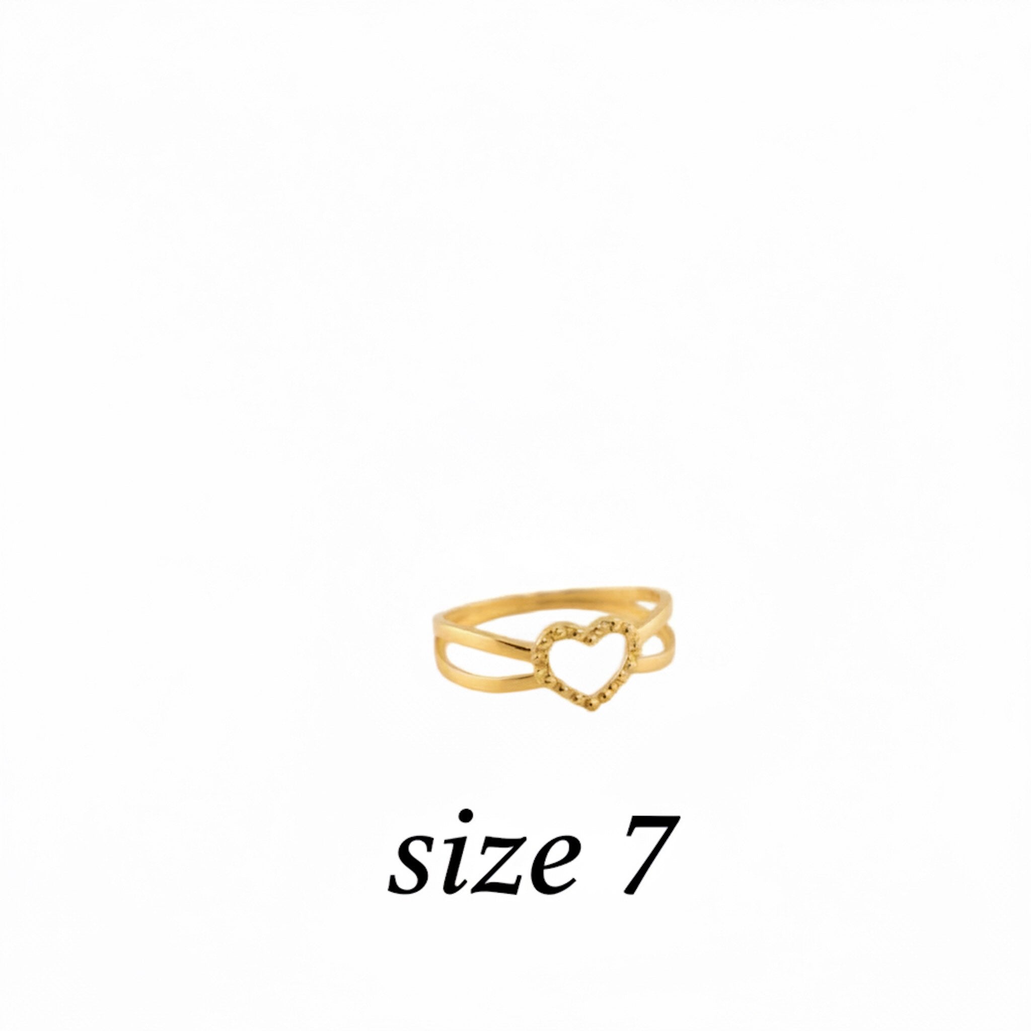Anillo delgado con corazón abierto minimalista en Oro 14K talla 7 de TuOro, estilo fino y elegante para uso diario