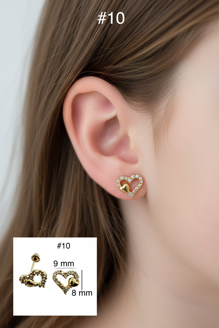 Arete pequeño en oro 14K con cierre de rosca, diseño de corazón calado con circonias de 9 x 8 mm y detalle macizo lateral, TuOro.