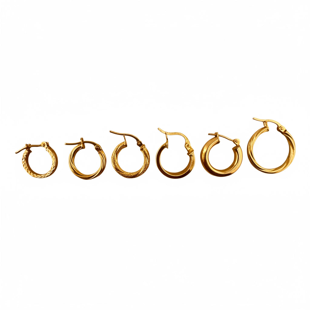 Aretes argollitas para niños en oro 14K, modelos pequeños variados: torcidos, lisos, satinados y diamantados. Argollitas cómodas y seguras para uso diario.