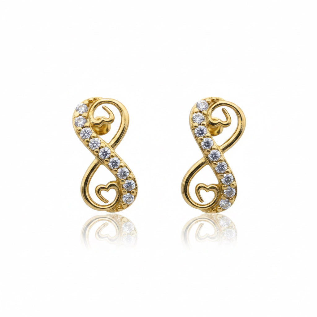 Aretes pequeños en Oro 10K con cierre de rosca, diseño infinito con corazones y circonias brillantes.
