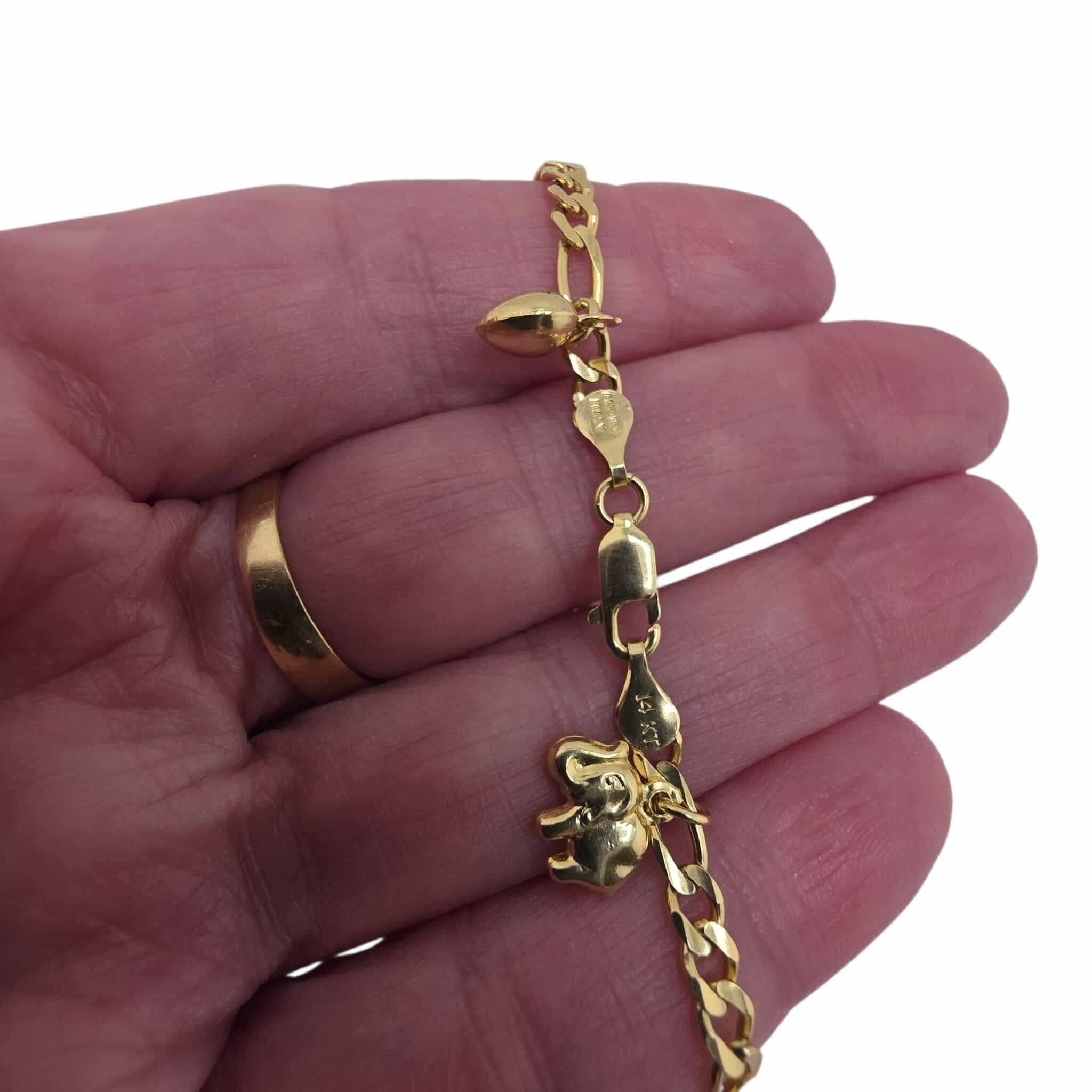 Pulsera Figaro de Oro 14K con dijes decorativos y cierre tipo candado de TuOro