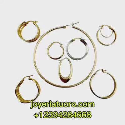“Video corto que muestra variedad de argollas en oro 14K con diferentes diseños: lisos, bicolor con circonias, texturizados, ovalados, concéntricos, meandro y de forma fina extragrande.”