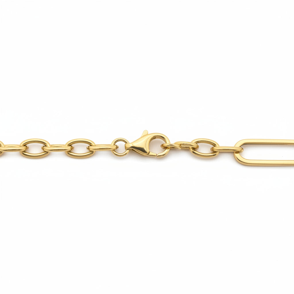 Detalle del cierre de langosta y eslabones de pulsera Paperclip combinada en Oro 14K TuOro, acabado pulido