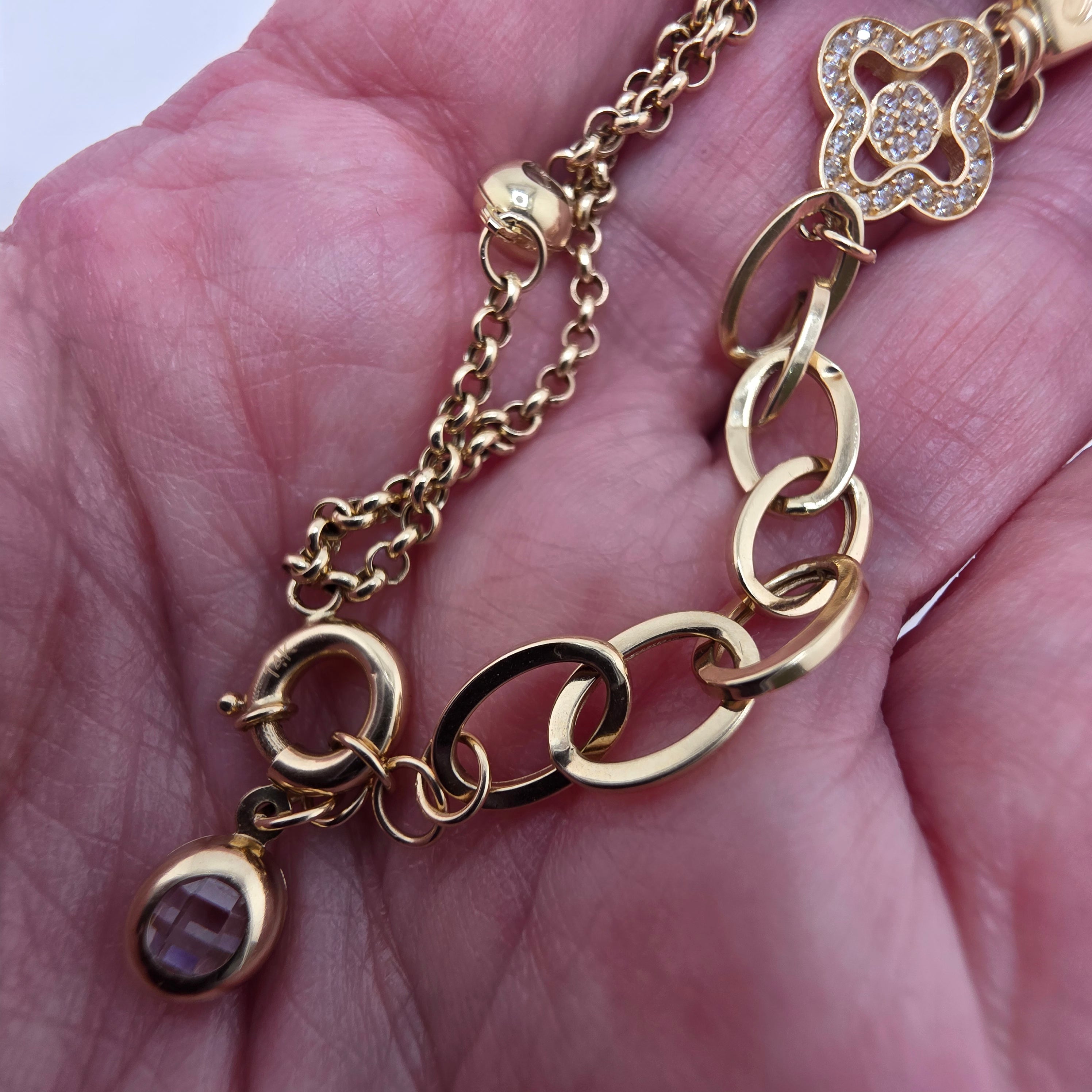 Pulsera Rolo en Oro 14K con trébol y candado