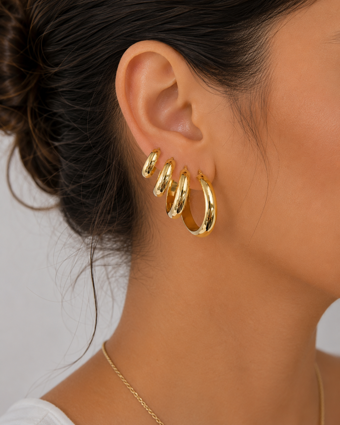 Argollas de aro lisas media caña en oro 14K
