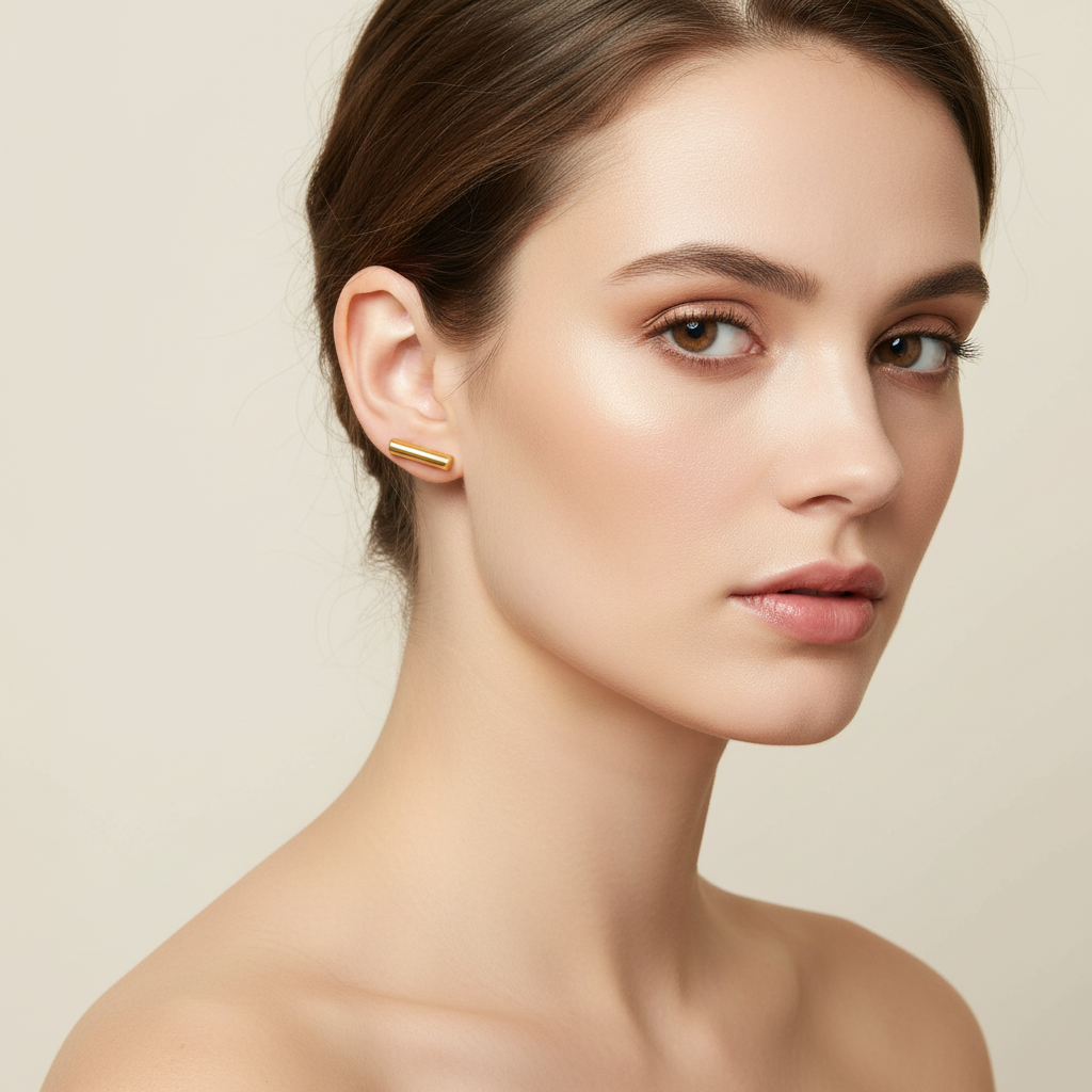 Aretes barra en oro amarillo 18K con cierre mariposa 💛✨